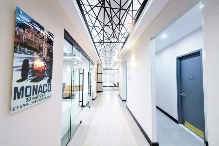 Stone Hallways with Designer Ceilings